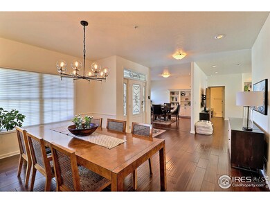 Warm, Inviting Entryway with Formal Dining Room and Living Room Area
