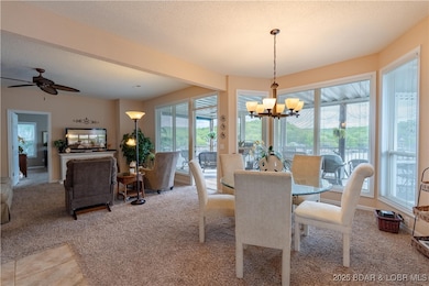LARGE OPEN FLOOR PLAN w/TONS OF LAKESIDE WINDOWS