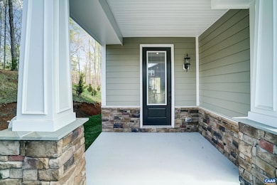 Covered front porch welcomes you home.