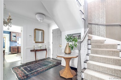 Entrance Foyer with Hardwood Floors and millwork