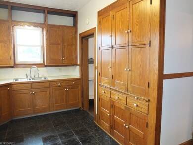 Kitchen has tons of cabinet space and a pantry!