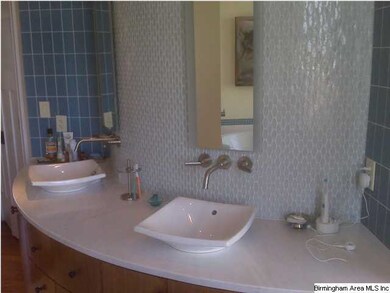 Gorgeous curved vanity in master bath