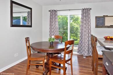 Dining room with slider access to patio. Laminate 