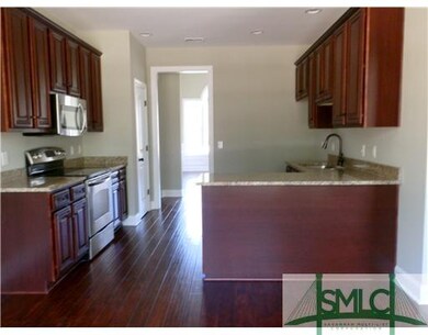 Kitchen. Gorgeous granite countertops, stainless a