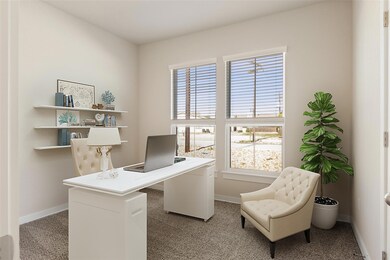 Office with baseboards and carpet