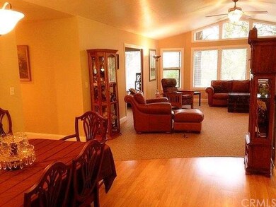 Open floor plan with kitchen dining area opening u