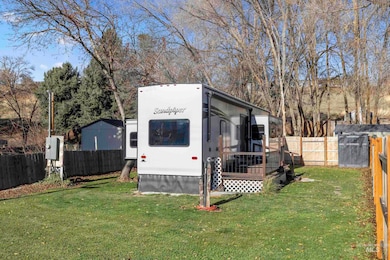 View of outdoor structure with a fenced backyard