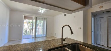 6505 Emerald Dunes Dr unit 307, West Palm Beach, FL 33411 - photo 2