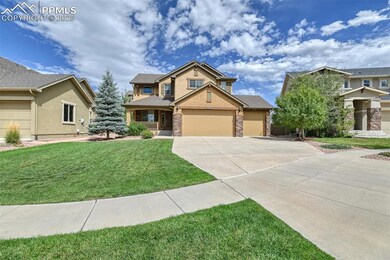 Craftsman-style house featuring a porch, a garage,