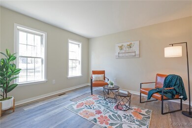 Living area featuring light hardwood / wood-style