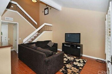 closer view the living room and stairs