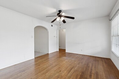 Unfurnished room featuring ceiling fan, a healthy 