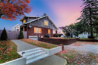 Property exterior at dusk with a garage