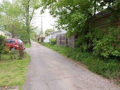 Other Private road leading to garage behind house