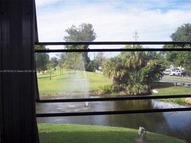 WRAP AROUND PORCH OVERLOOKS FOUNTAIN AND LAKE