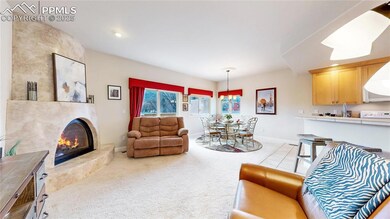 Towards the dining area.  Big windows capture the 