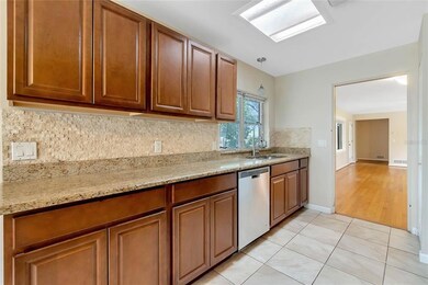 Kitchen with granite counters and stainless appliances 