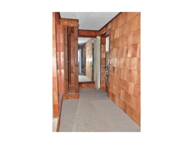 The entryway offers carpeting & provides access to