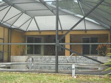 Screened in-ground pool area