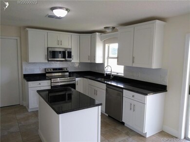 1584 SW Abacus Ave, Port Saint Lucie, FL 34953 - photo 2