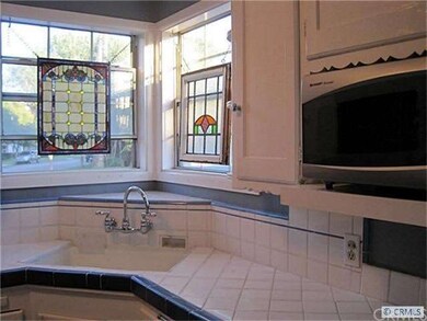 Kitchen counters are ceramic tile