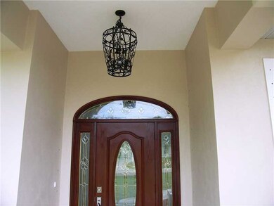 Exterior Front. Front Door and Light