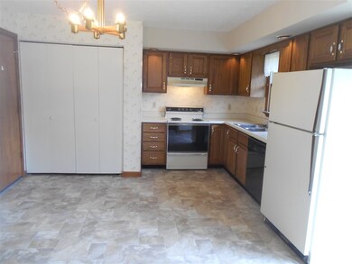 Large eat-in kitchen dining combination.