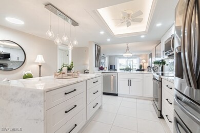 Pendant lighting over island.
