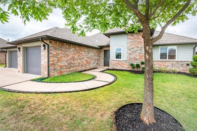View of front of home featuring a garage and a fro
