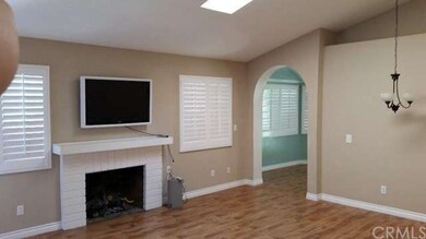 Cozy fireplace in family room.