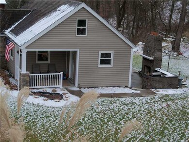 Exterior Front. New Side Concrete Porch w/Stone Co