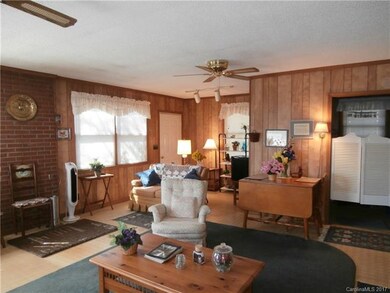 Spacious brick ranch with 2 bay+ garage and 1 acre