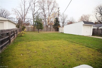 View of yard featuring a storage shed