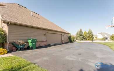 Side Load 3 car garage...3rd car is heated with wa