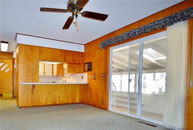 Dining area leading out to the screened in porch.