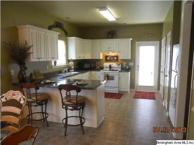 Kitchen with all appliances to remain