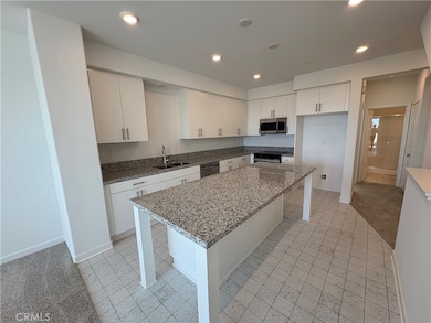 Beautiful kitchen with large island for dining