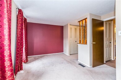 Master bedroom is spacious, includes a dressing ar