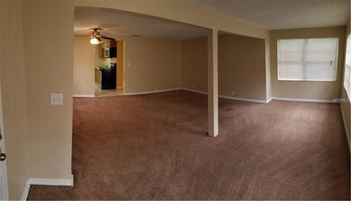 Entrance looking into dinning room (right) and liv