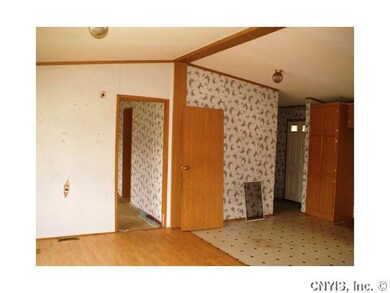 Living Room. Living room, dining area, and entranc