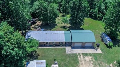 Home sits on over an acre with deck in back yard, 
