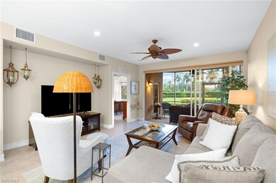 Living room with tile flooring and ceiling fan