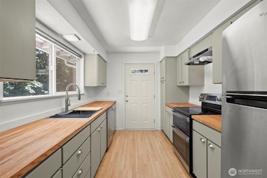 Beautiful renovated kitchen with access to the wrap around porch