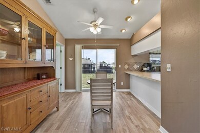 Dining area with baseboards, vaulted ceiling, ceil