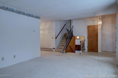 Living Room access to up & down stairs