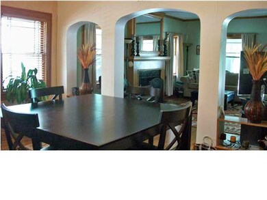 Large Formal Dining Room~ Notice Archways and Wood