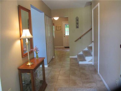 Entry/Foyer. Door to Family room is the first on r