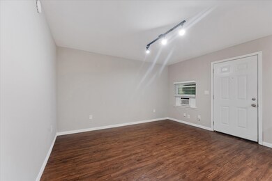 View of the living space from the bathroom entranc