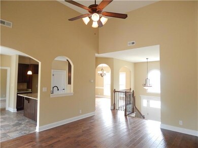 Looking back through home.  Beautiful arches.  Wonderful natural light.