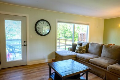 Living room featuring wood-type flooring